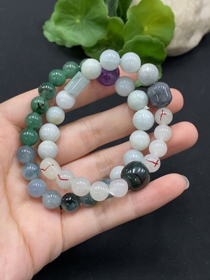 F35115044 Jadeite bracelet with non-A grade beads and impurity stones