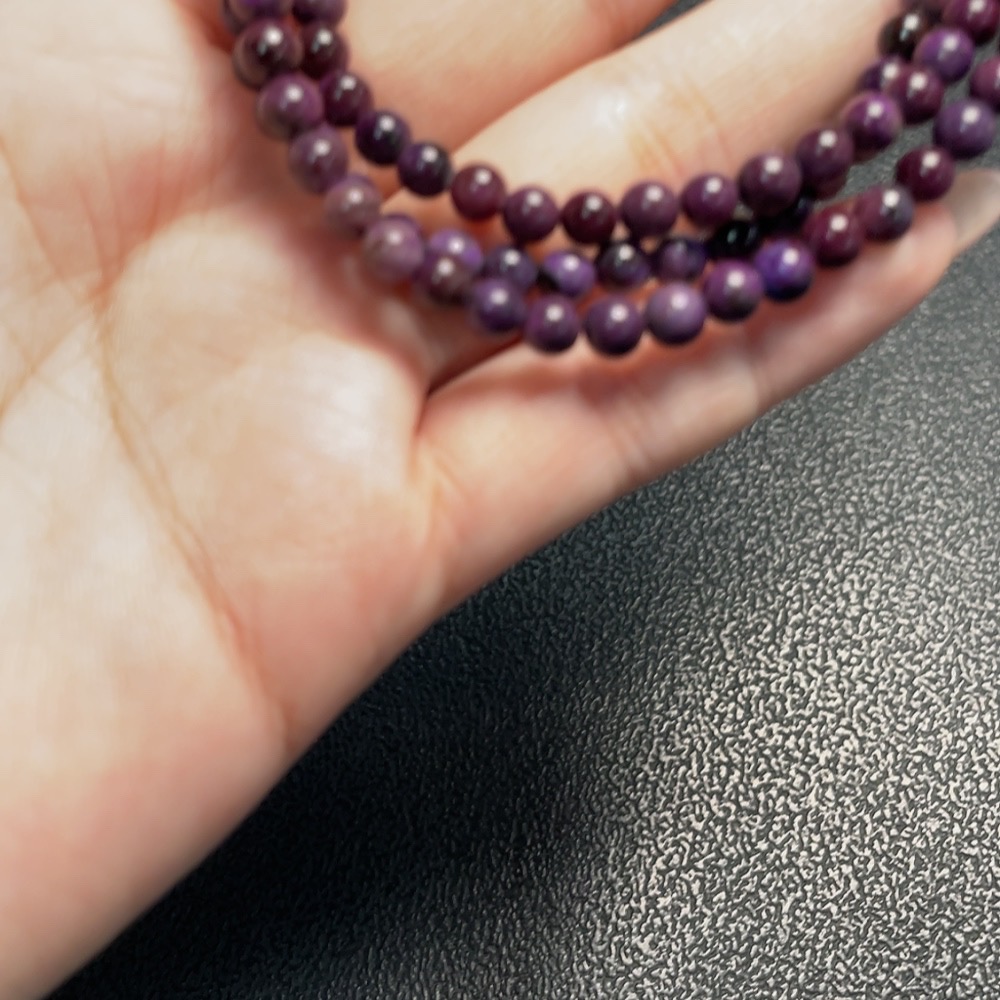 C34009644 Sugilite Bead Strand (with mineral inclusions)