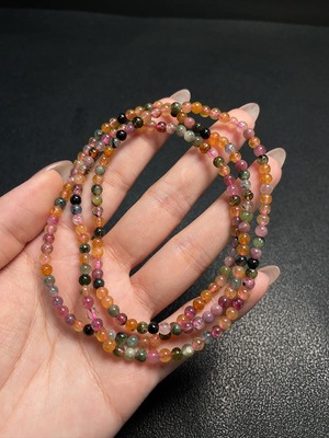 C34008843 Tourmaline bead strand with other mineral components, visible organic matter, total weight approx. 17.98g, size approx. 3.9mm