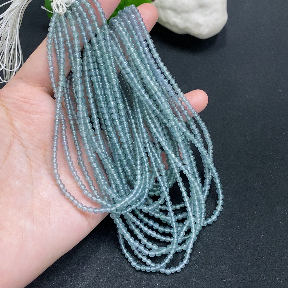 F33856447 A batch of 9 jadeite bead bracelets