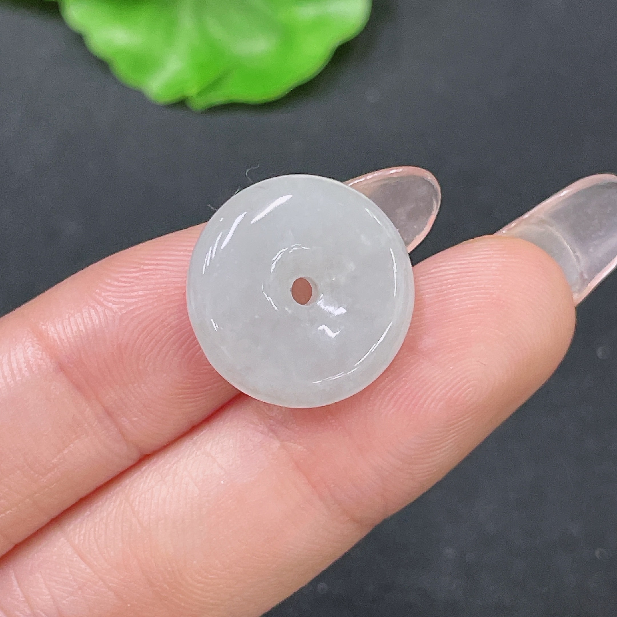 F34064356 Jadeite Peace Knot Pendant with a total weight of approximately 3 grams