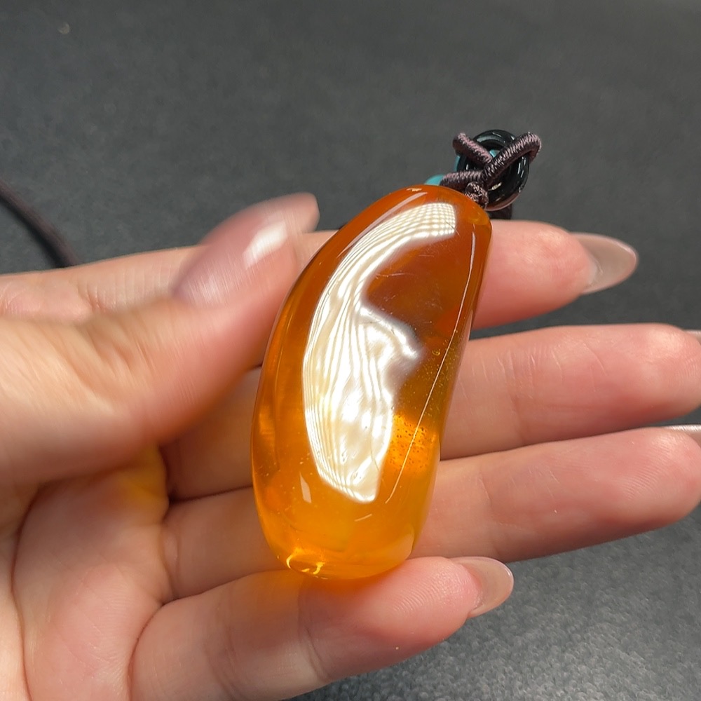 C34992979 Amber Honey Wax Pendant Non-Gold Total Weight Approx. 21.5g Including Rope