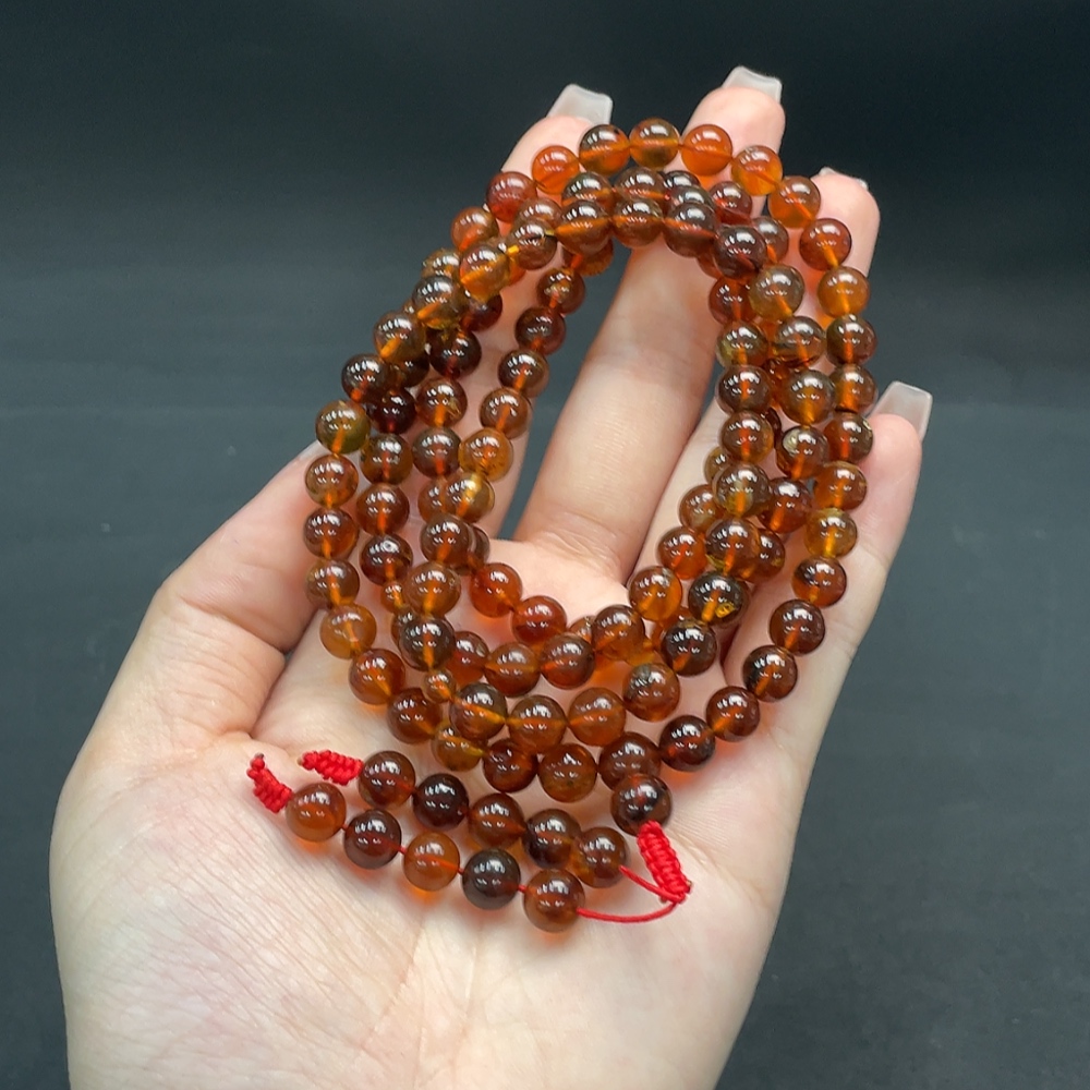 C16760810 Amber Beeswax Bead Strand Approx. 24.36g 7.3mm