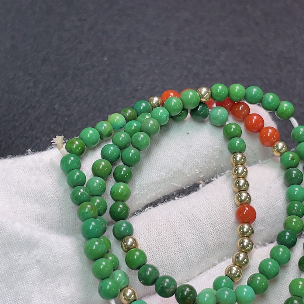 C33922751 Turquoise bead strand with amber and southern red agate, color origin undetermined, containing other mineral components, non-gold, total weight approximately 17.37g, bead size about 4.4mm