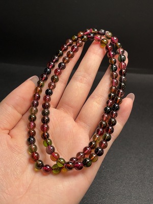 C30511386 Tourmaline Bead Strand Approximately 5.8mm Total Weight About 33.26g Containing Other Mineral Components Visible Organic Matter