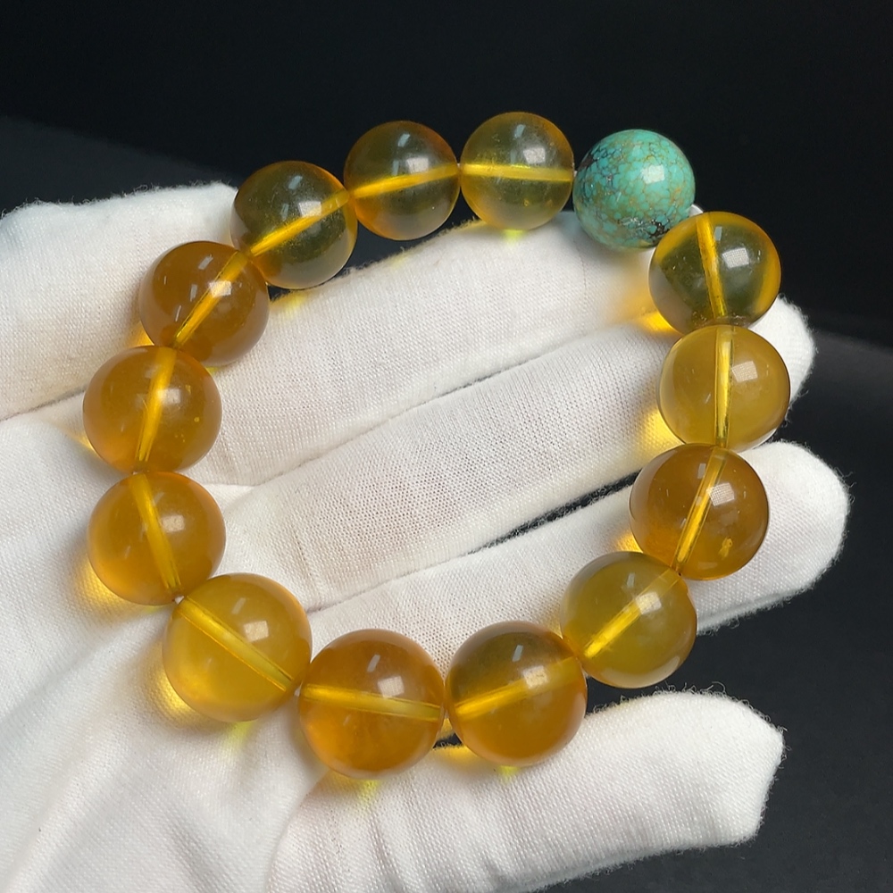 C33921132 Amber Beeswax Bracelet with Turquoise (color origin undetermined) containing other mineral components, total weight approx. 31.69g, size approx. 14.7mm
