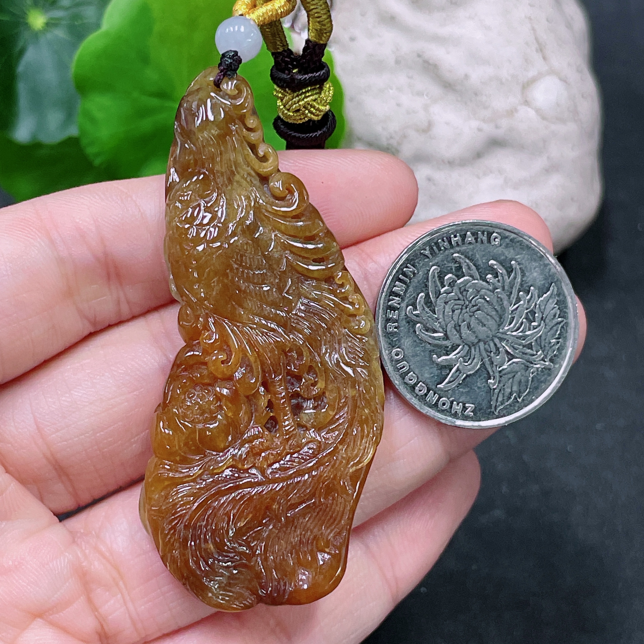 F33838640 Jadeite Pendant, color origin undetermined, total weight including string approx. 25.65g