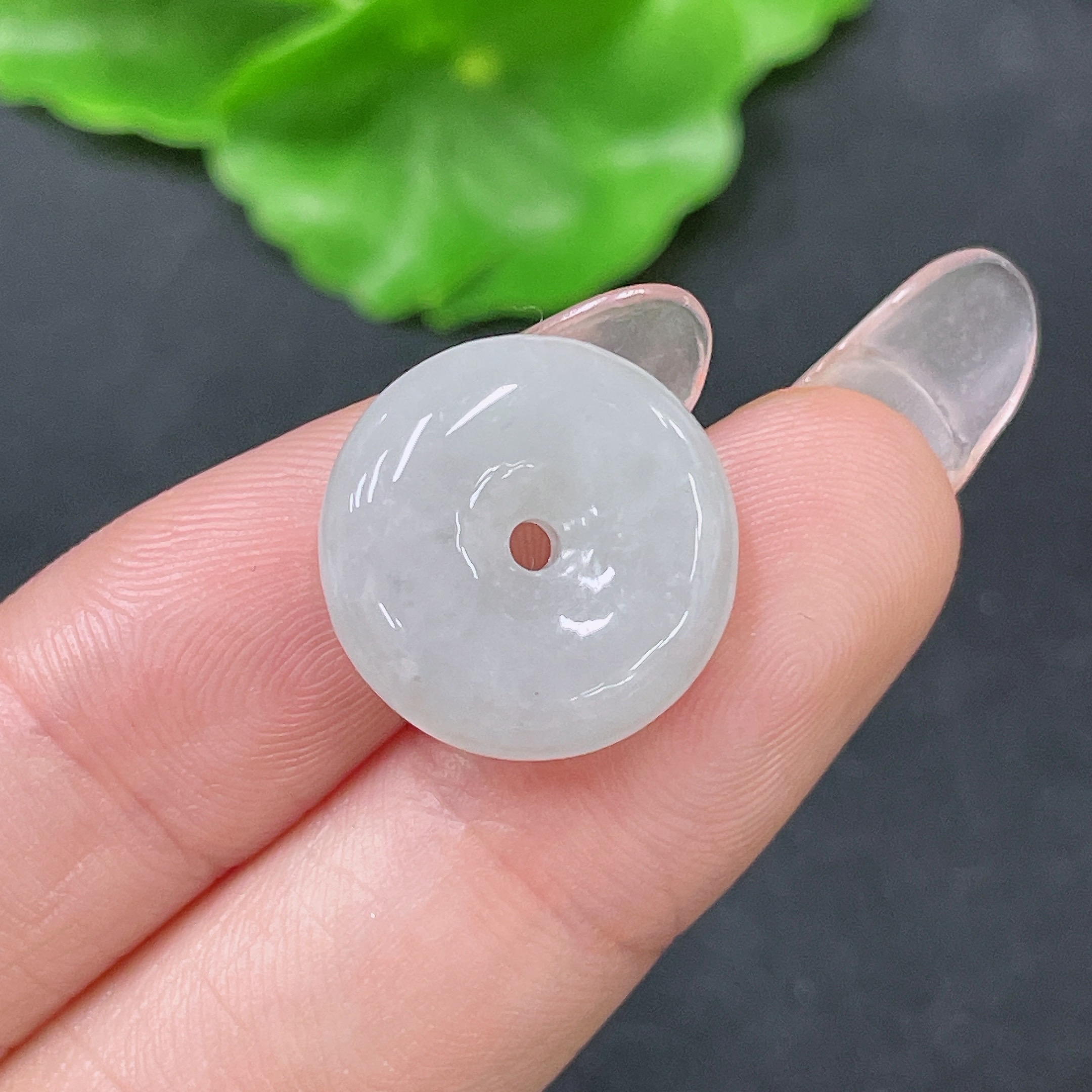 F34064356 Jadeite Peace Knot Pendant with a total weight of approximately 3 grams