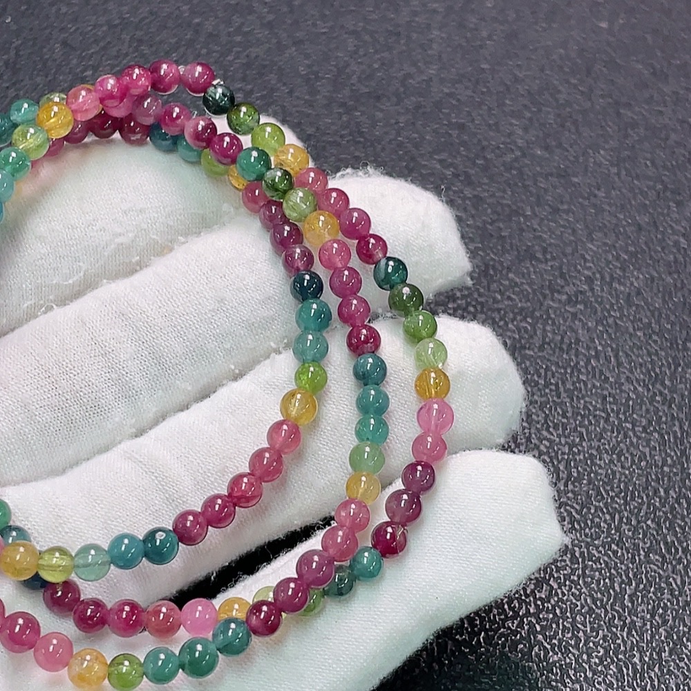 C33922632 Tourmaline bead strand with visible organic matter, total weight approx. 15.48g, bead size approx. 4mm