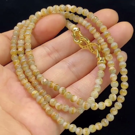 F34024094 Jadeite bead necklace, approximately 3.6mm in size, total weight about 18.79g, non-gold, yellow part color origin undetermined