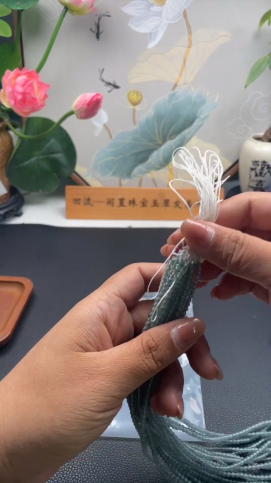 F33856447 A batch of 9 jadeite bead bracelets