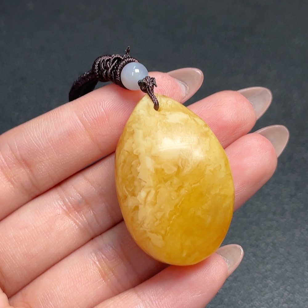 C34992977 Amber Beeswax Pendant Total Weight Approx. 10.97g with Cord
