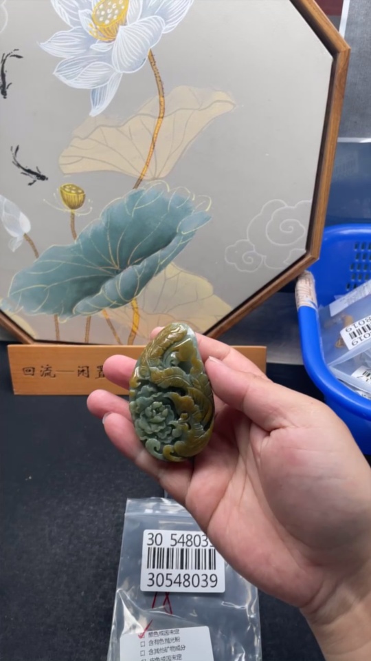 F30548039 Jadeite Phoenix and Peony Pendant with a total weight of approximately 96.2 grams (Color origin undetermined)