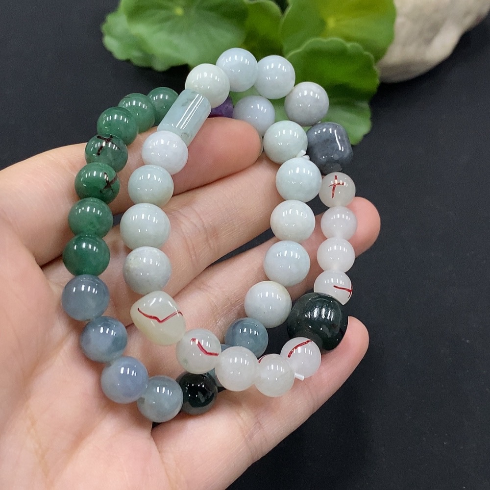 F35115044 Jadeite bracelet with non-A grade beads and impurity stones