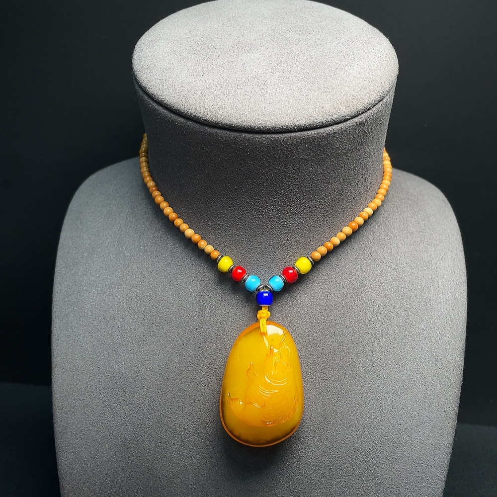 C34066888 Amber Beeswax Pendant with Colorless Coating, Total Weight Approx. 16.50g Including Chain, Chain Not Natural