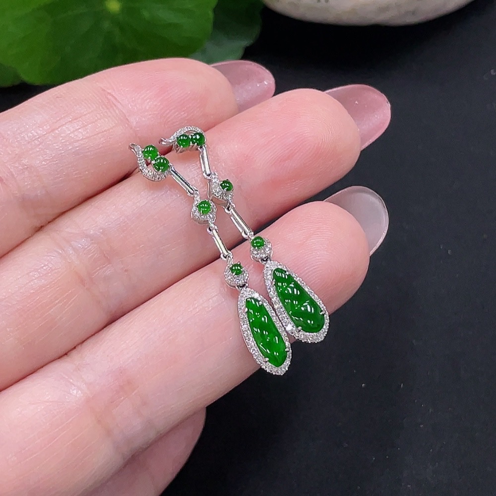 F34982006 Jadeite earrings set in 18K gold with diamonds, total weight approximately 2 grams per pair