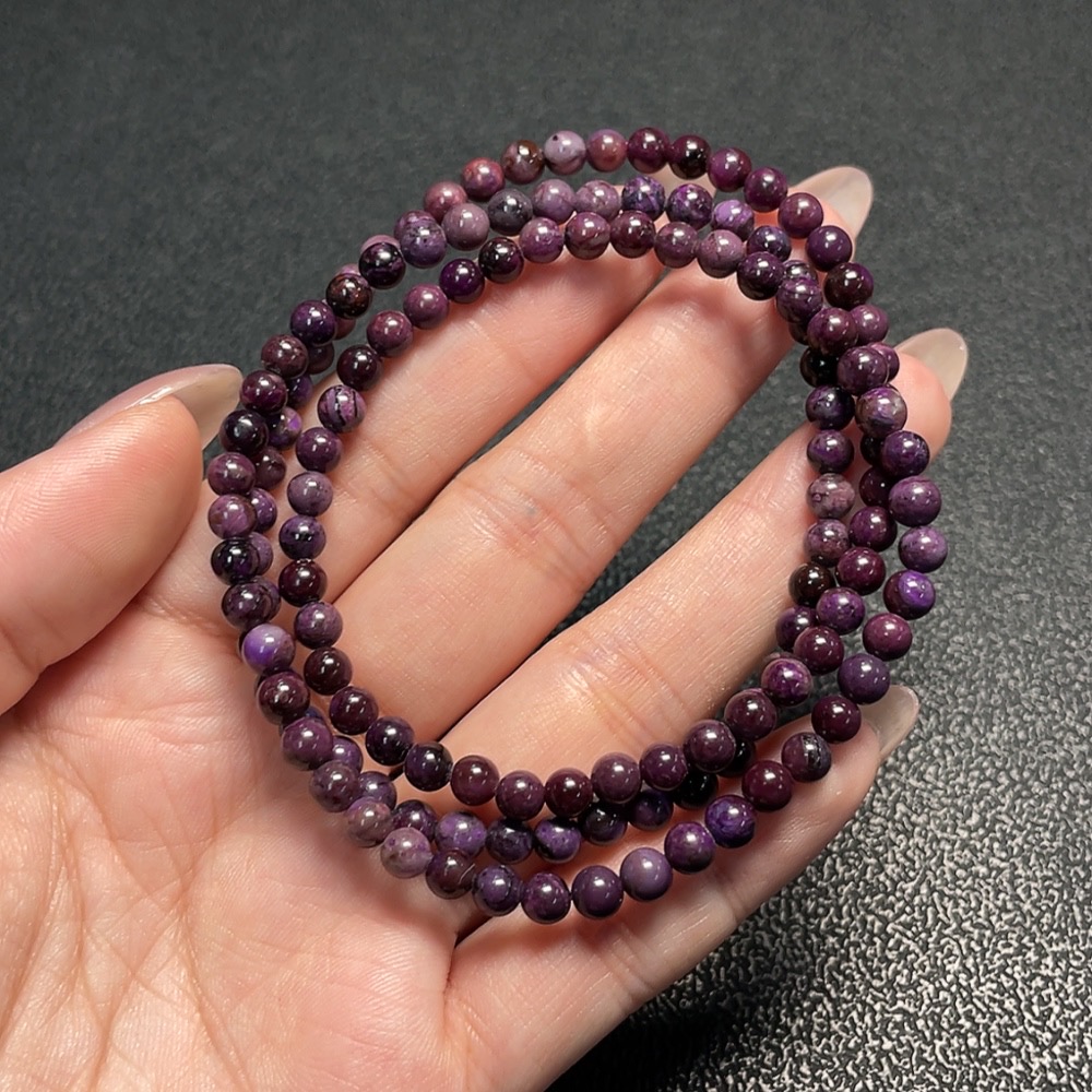C34009644 Sugilite Bead Strand (with mineral inclusions)
