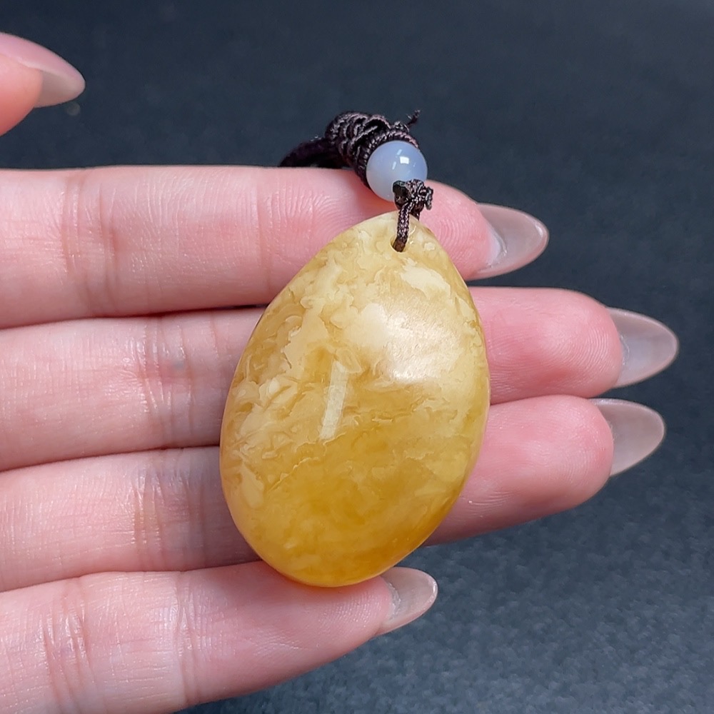 C34992977 Amber Beeswax Pendant Total Weight Approx. 10.97g with Cord