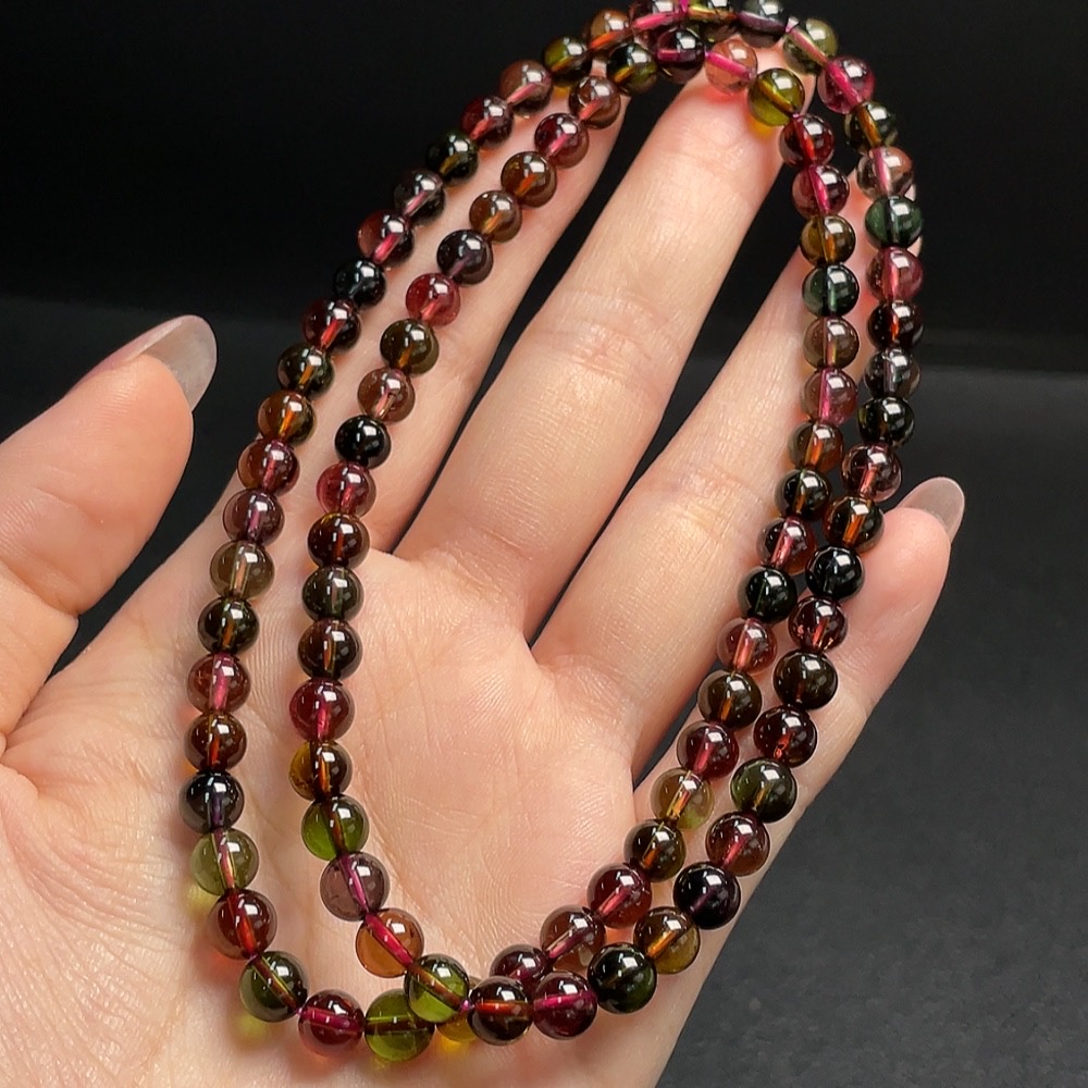 C30511386 Tourmaline Bead Strand Approximately 5.8mm Total Weight About 33.26g Containing Other Mineral Components Visible Organic Matter