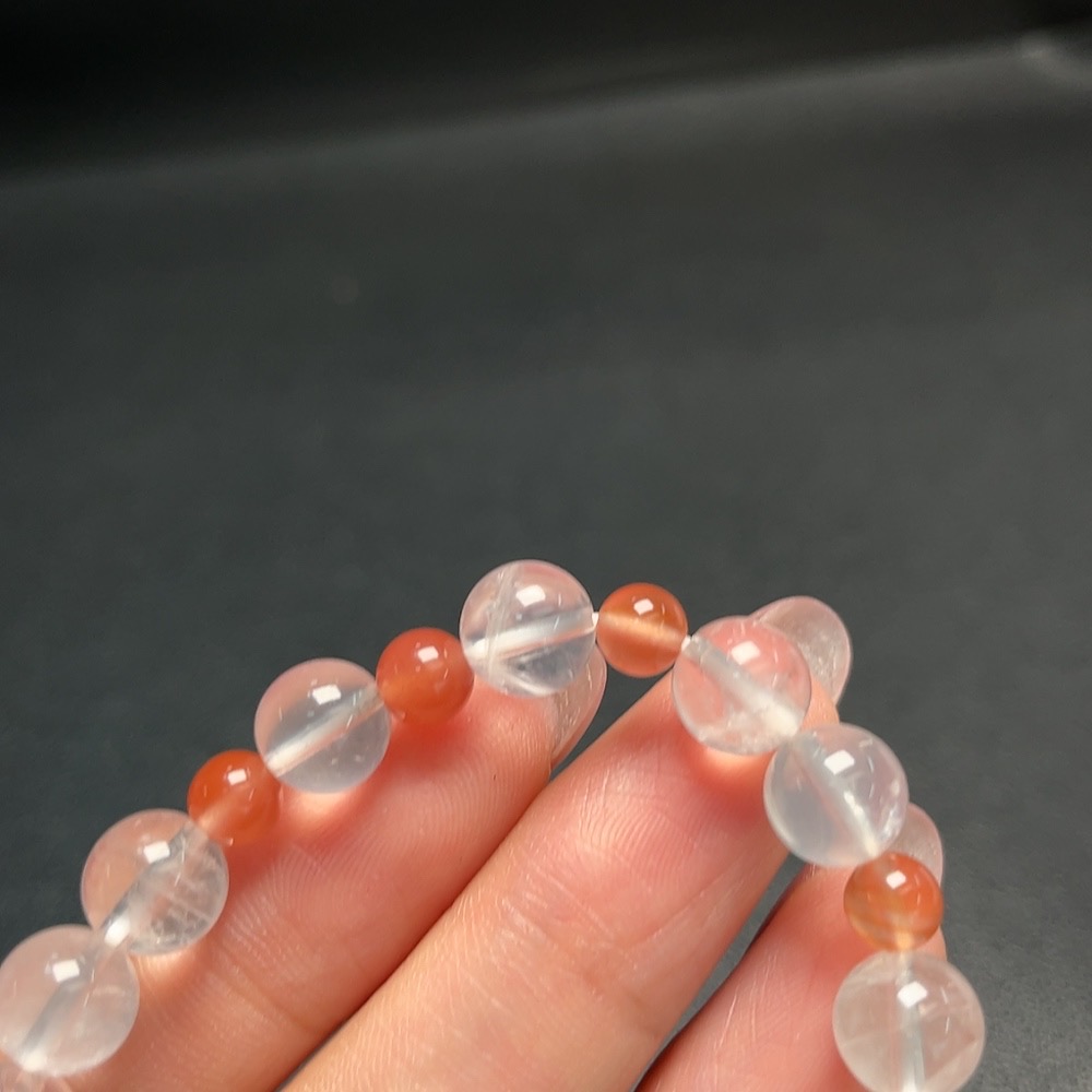 C30469368 Crystal Bracelet with approximately 8mm beads, total weight about 14.99g, paired with Southern Red Agate (visible organic matter)