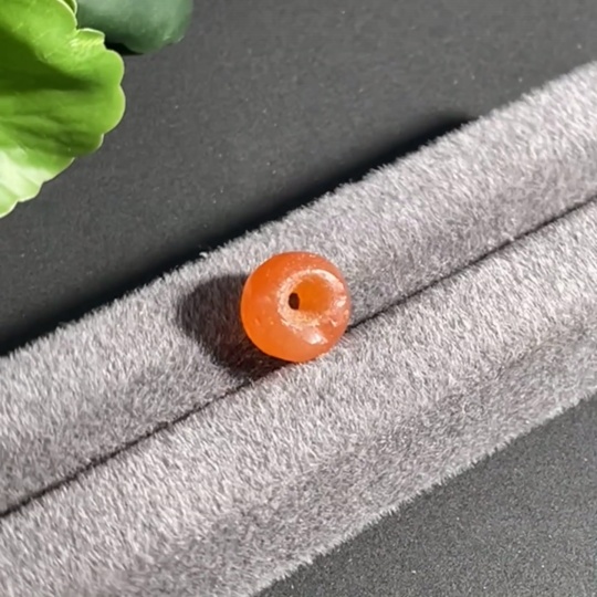 W41948005 Millennium-old red agate drum-shaped bead from the Western Asia region, antique bead