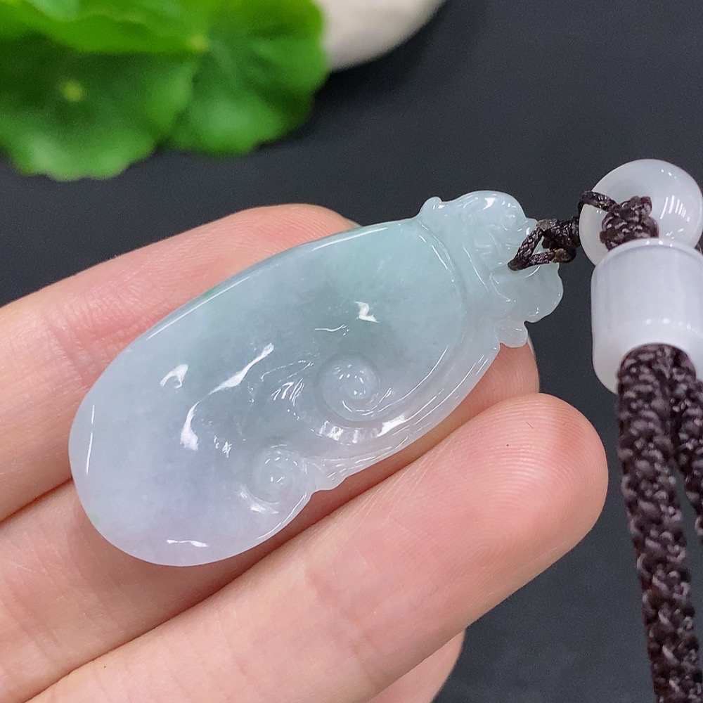 F33832095 Jadeite Ruyi Pendant Total weight approx. 13.4g (including cord weight) Matching beads not jadeite