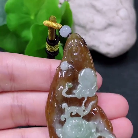 F33838640 Jadeite Pendant, color origin undetermined, total weight including string approx. 25.65g