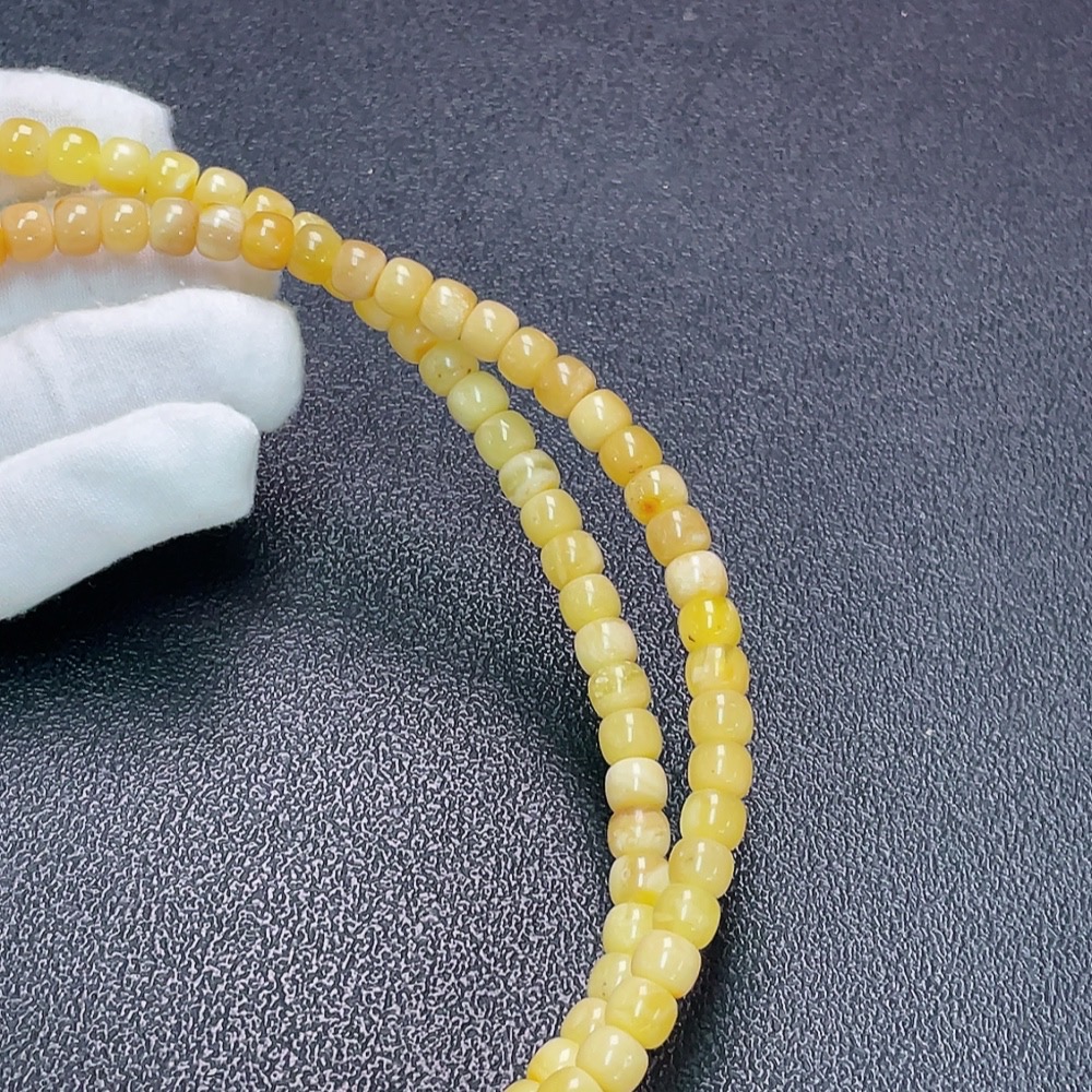 C32816658 Amber Beeswax Bead Strand, Total Weight Approx. 28.52g, Size Approx. 7.1mm