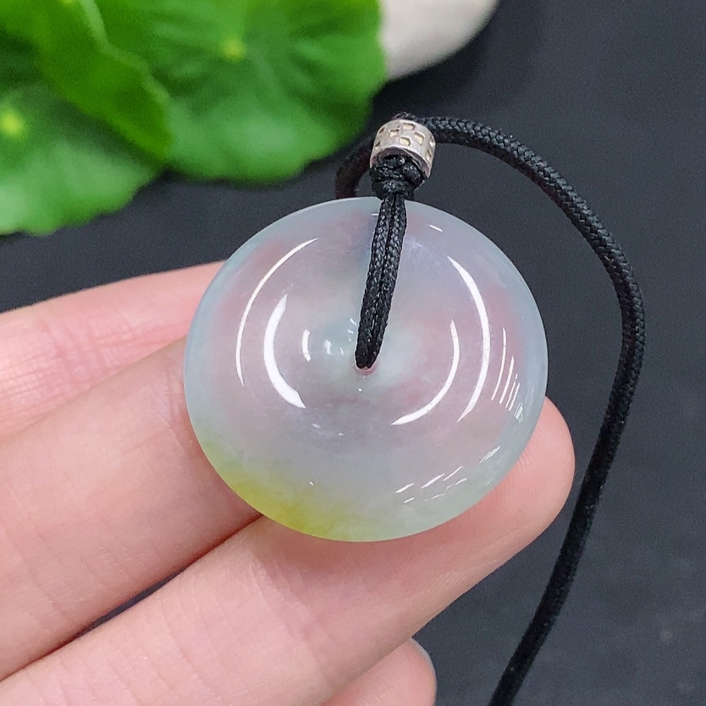 F33908119 Jadeite Peace Knot, total weight including cord approximately 10.3g