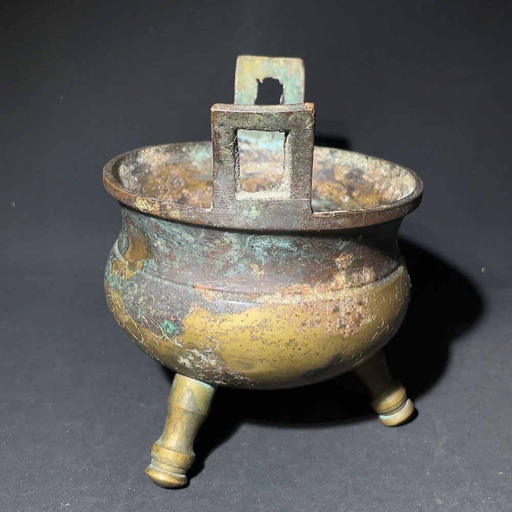 W28238912 Miscellaneous Late Qing and Republic Period Three-legged Double-handled Copper Incense Burner with Floral Engravings