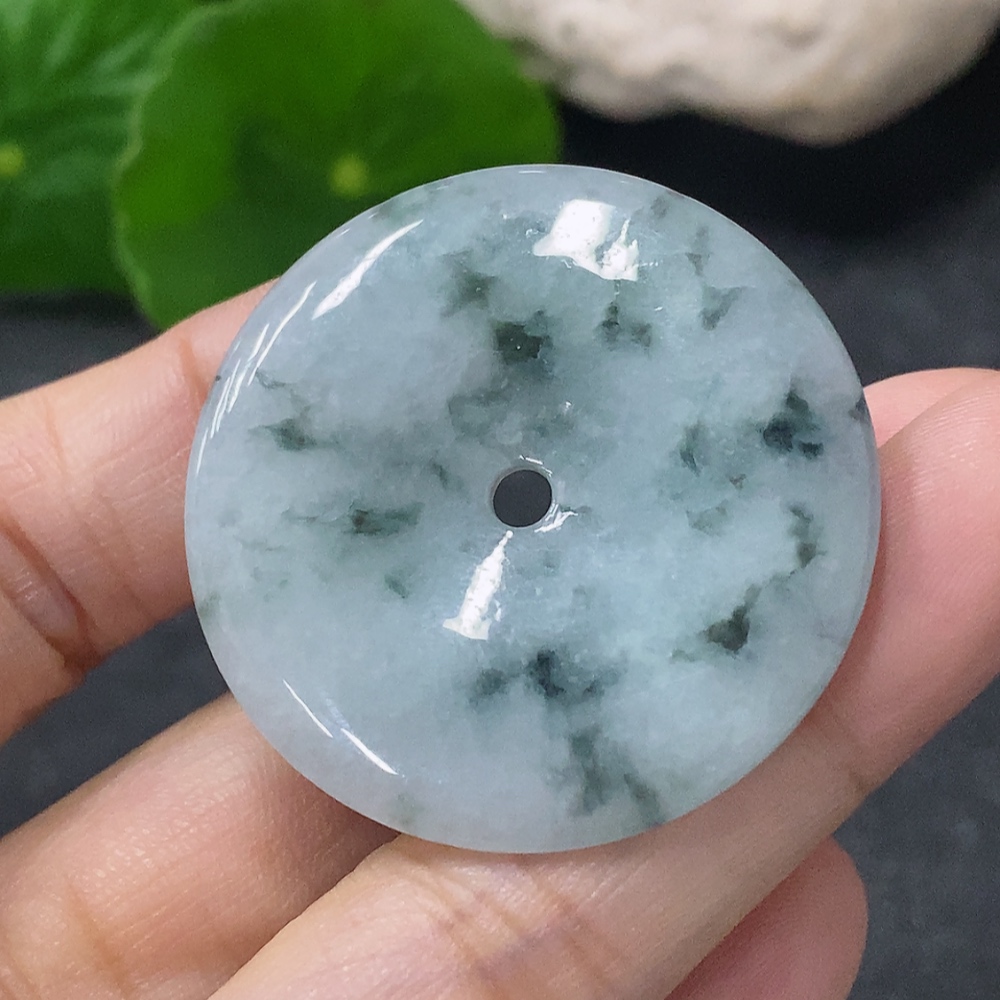 F34041946 Jadeite Pendant Peace Knot with an approximate total weight of 12.36g and containing other mineral components