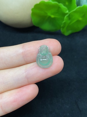 F45338264 翡翠财神戒面 总重约0.66g