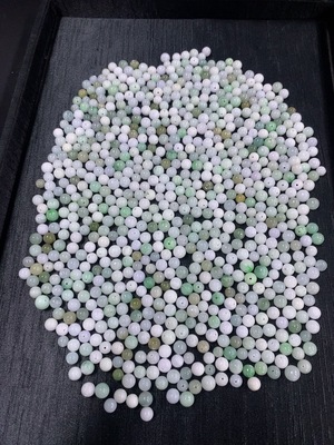 F46549025 翡翠珠子 一手走60+ 颜色成因未定 含其他矿物成分  货品总重约467.61g含袋