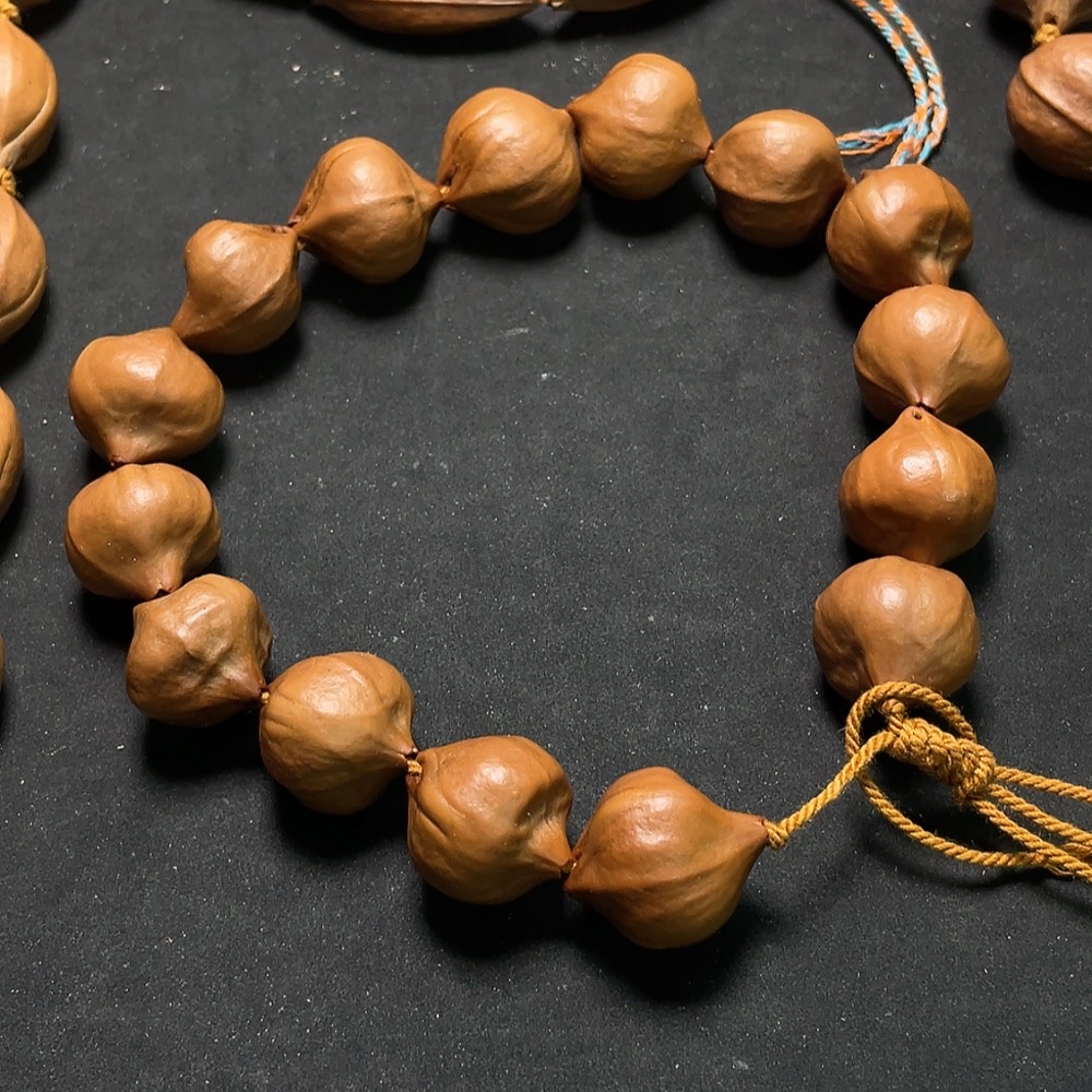 W33842770 Olive pit long bracelet + wrist bracelet, sold as a set