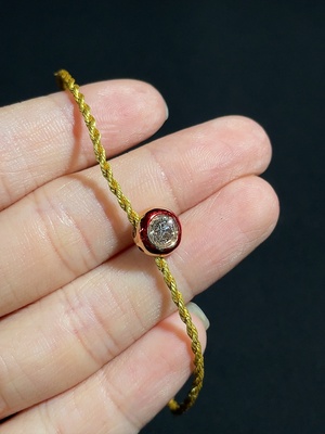 M44324976 钻石手串 标红18k金 其余非金 含绳 货品总重约1.1g 印记0.42ct