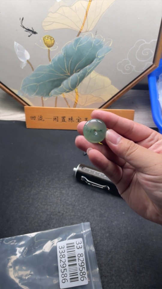 F33829586 JadeitePendant Peace Knot