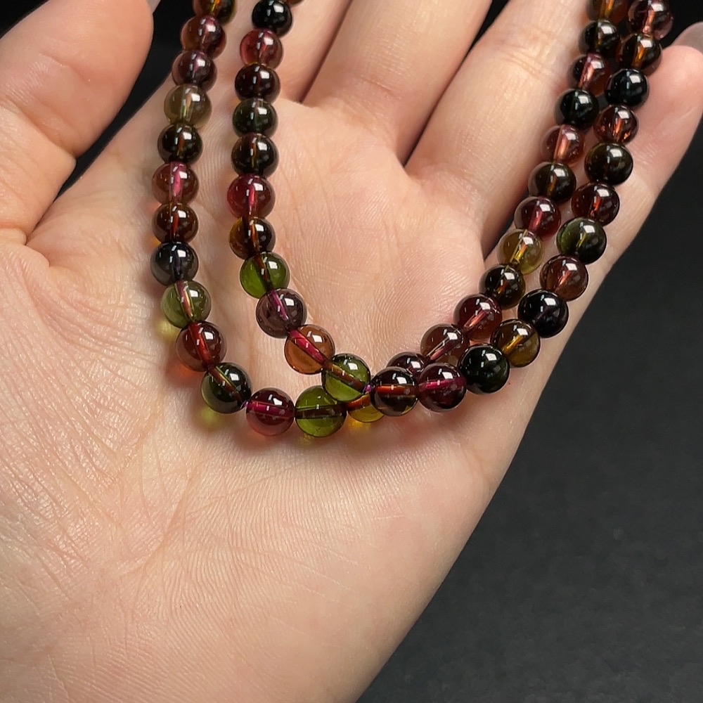 C30511386 Tourmaline Bead Strand Approximately 5.8mm Total Weight About 33.26g Containing Other Mineral Components Visible Organic Matter