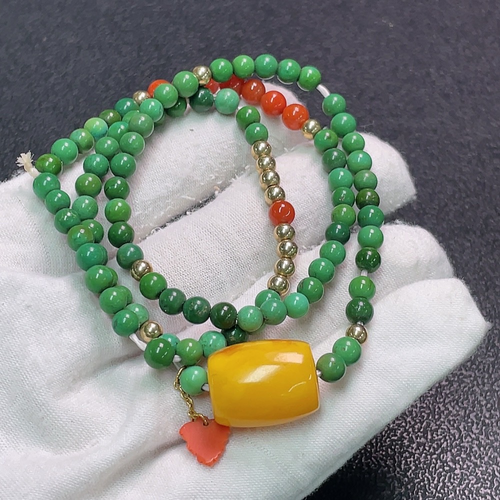 C33922751 Turquoise bead strand with amber and southern red agate, color origin undetermined, containing other mineral components, non-gold, total weight approximately 17.37g, bead size about 4.4mm