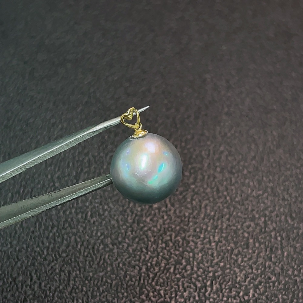 C32816889 18k combined sea water pearl pendant, color origin undetermined, total weight approximately 1.58g