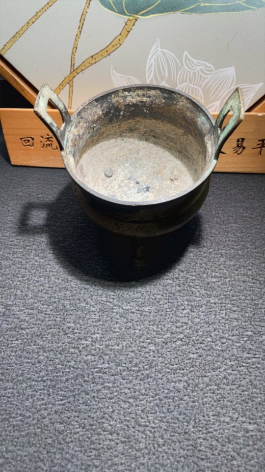 W28238912 Miscellaneous Late Qing and Republic Period Three-legged Double-handled Copper Incense Burner with Floral Engravings