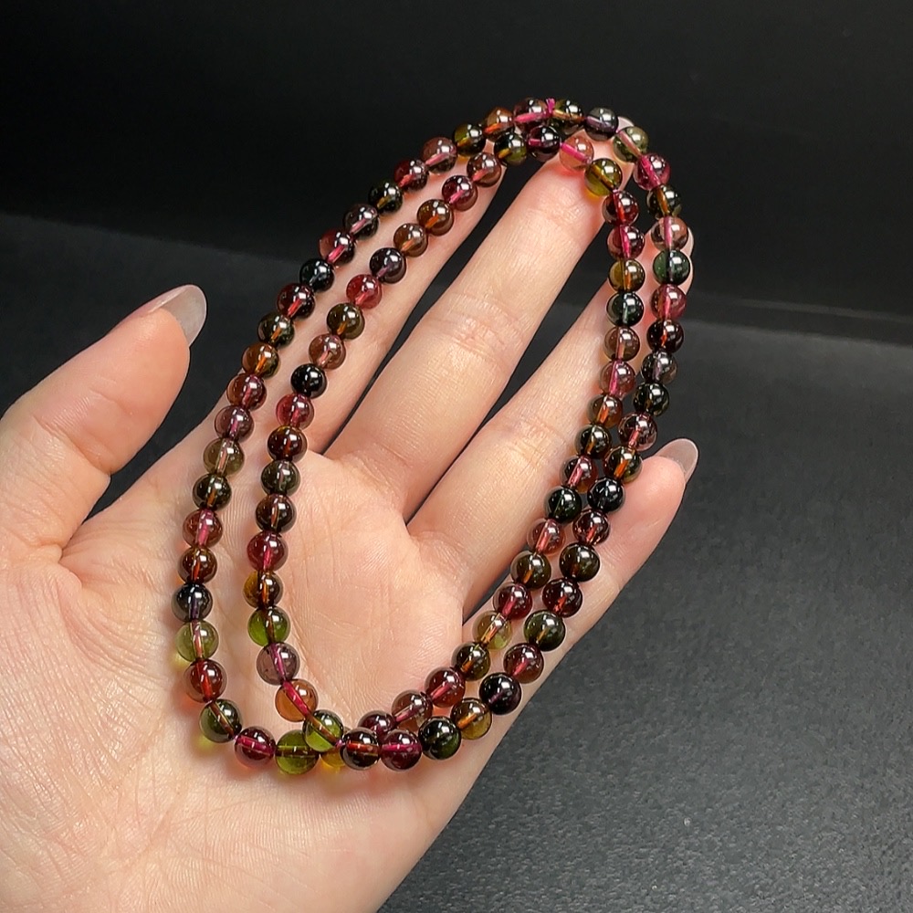 C30511386 Tourmaline Bead Strand Approximately 5.8mm Total Weight About 33.26g Containing Other Mineral Components Visible Organic Matter
