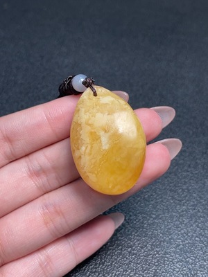 C34992977 Amber Beeswax Pendant Total Weight Approx. 10.97g with Cord