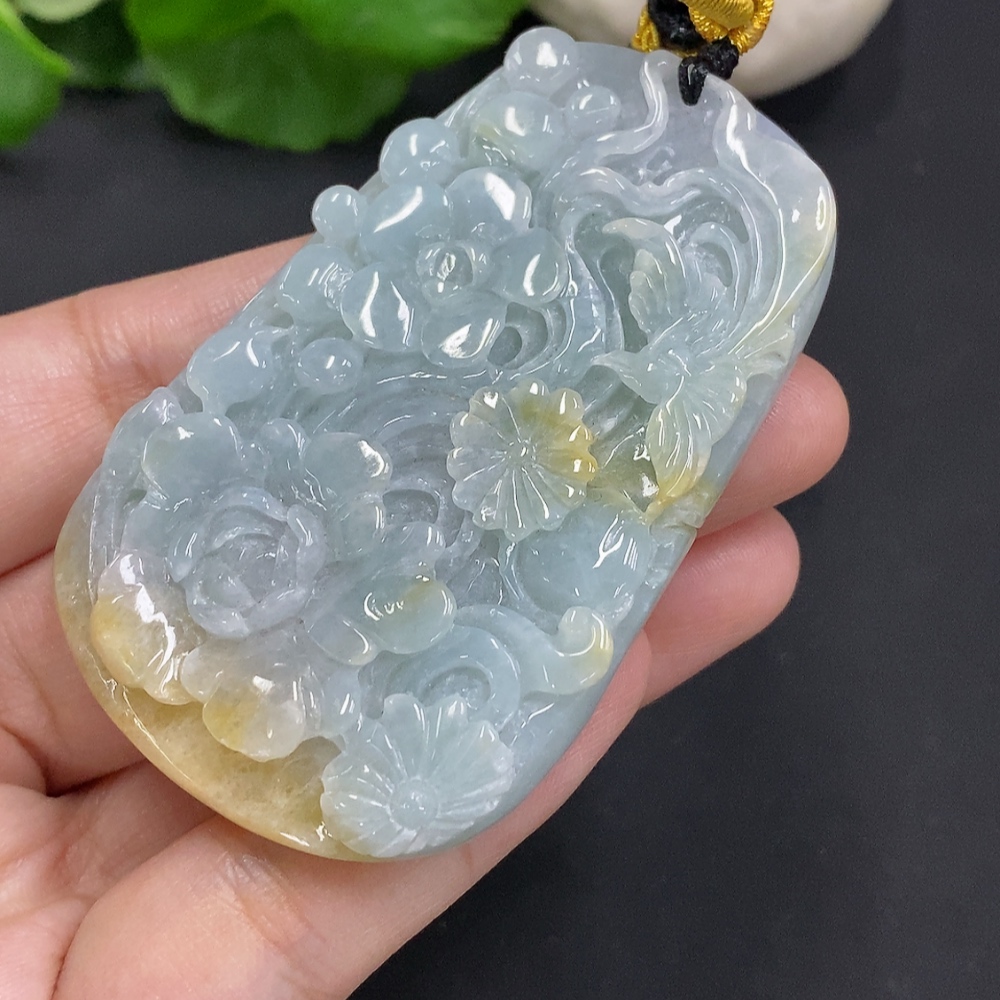 F35163715 Jadeite Flower of Prosperity Pendant with a total weight of approximately 58 grams including the cord