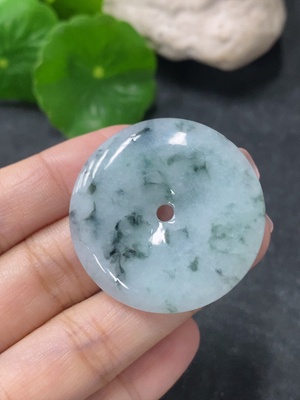 F34041946 Jadeite Pendant Peace Knot with an approximate total weight of 12.36g and containing other mineral components