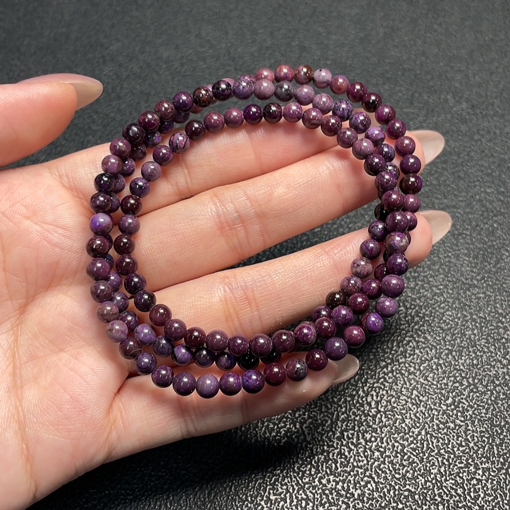C34009644 Sugilite Bead Strand (with mineral inclusions)