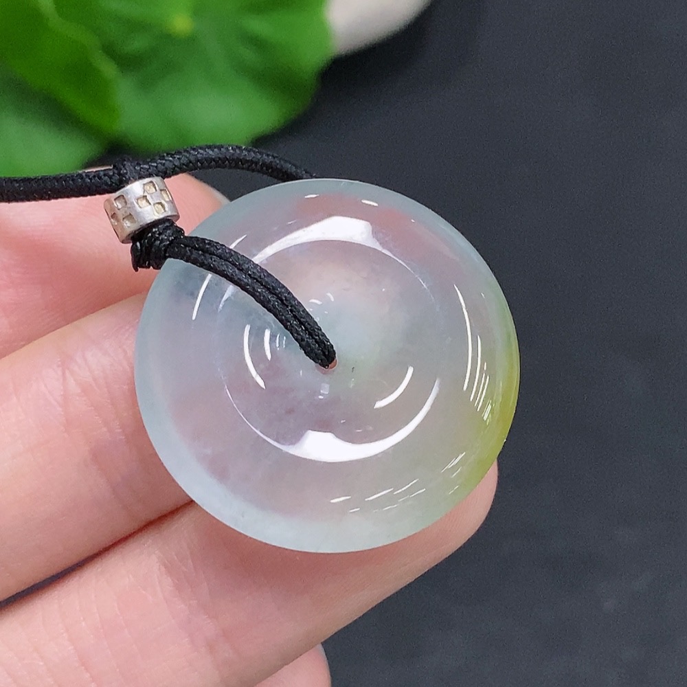 F33908119 Jadeite Peace Knot, total weight including cord approximately 10.3g