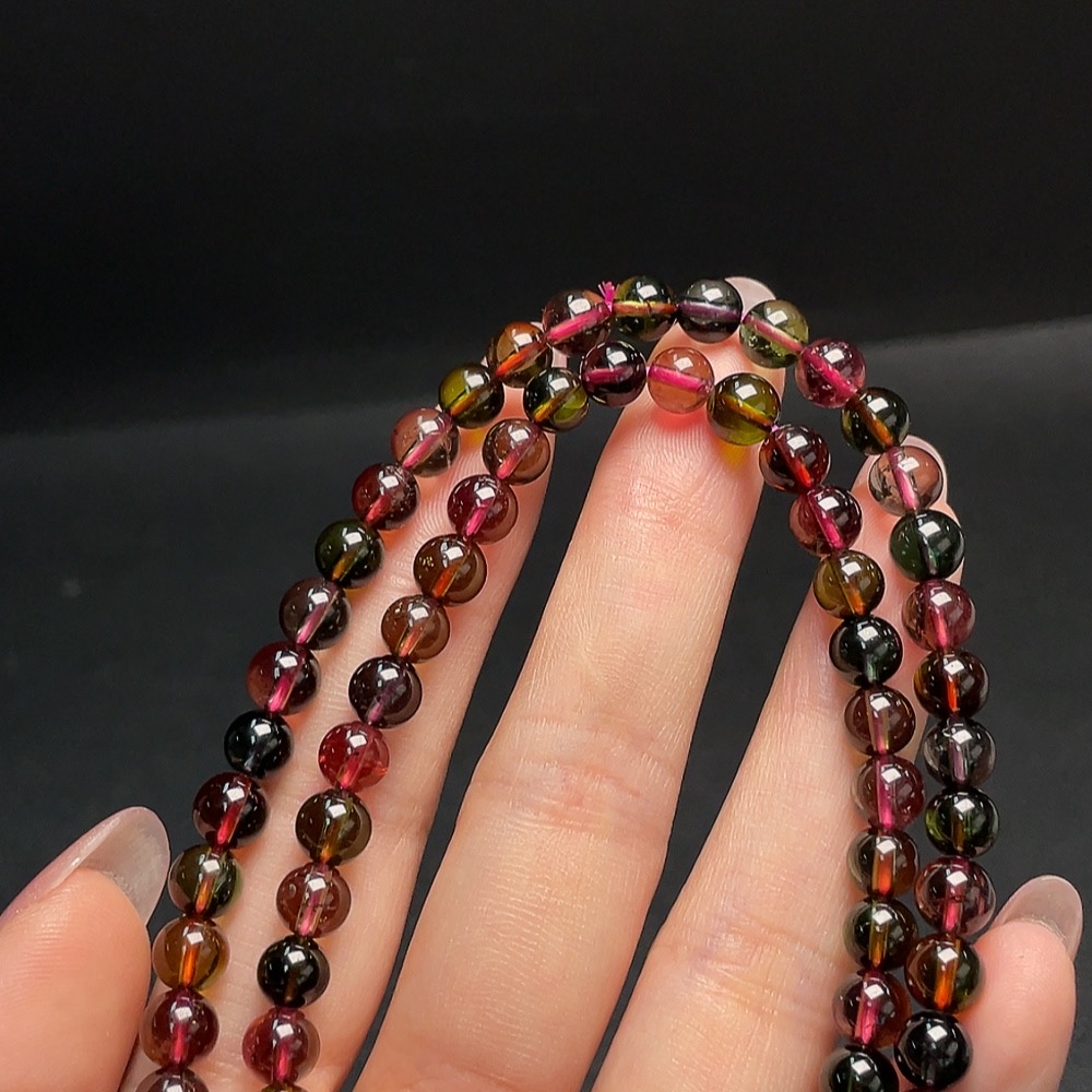 C30511386 Tourmaline Bead Strand Approximately 5.8mm Total Weight About 33.26g Containing Other Mineral Components Visible Organic Matter