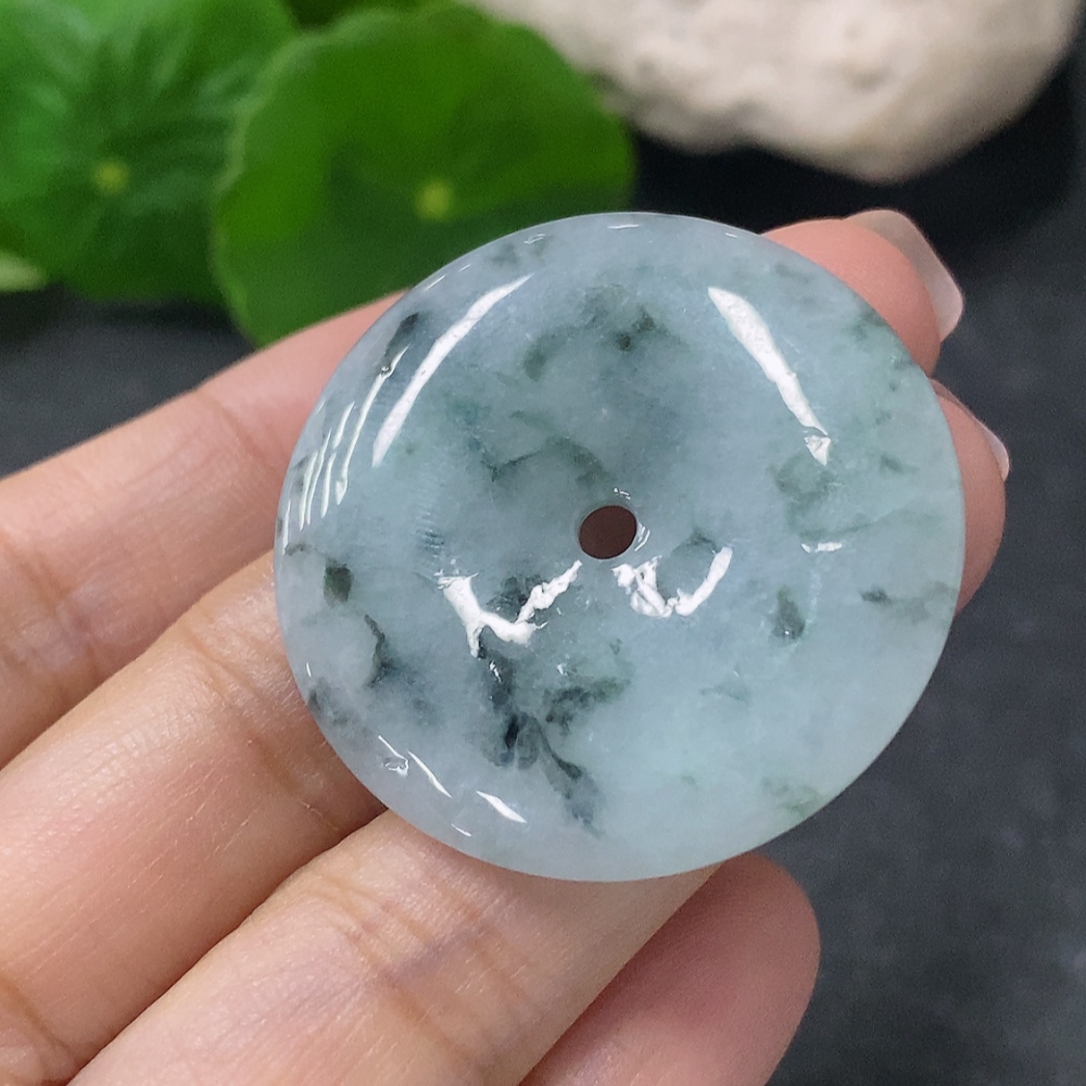 F34041946 Jadeite Pendant Peace Knot with an approximate total weight of 12.36g and containing other mineral components