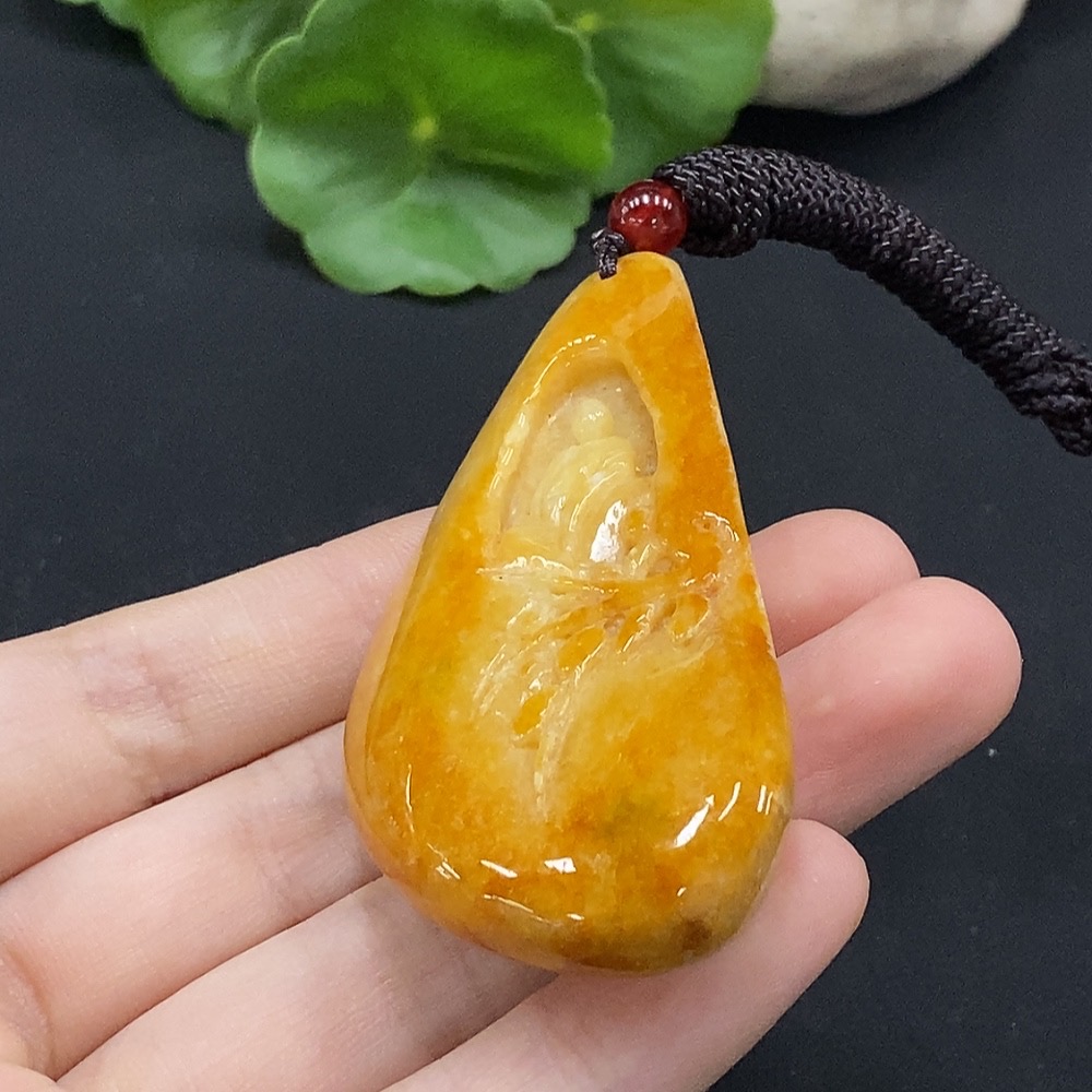 F34996577 Jadeite Enlightenment Pendant, coloration of yellow parts undetermined, total weight approximately 46.67g