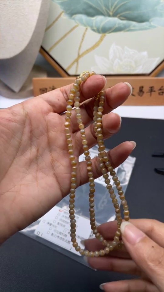 F34024094 Jadeite bead necklace, approximately 3.6mm in size, total weight about 18.79g, non-gold, yellow part color origin undetermined